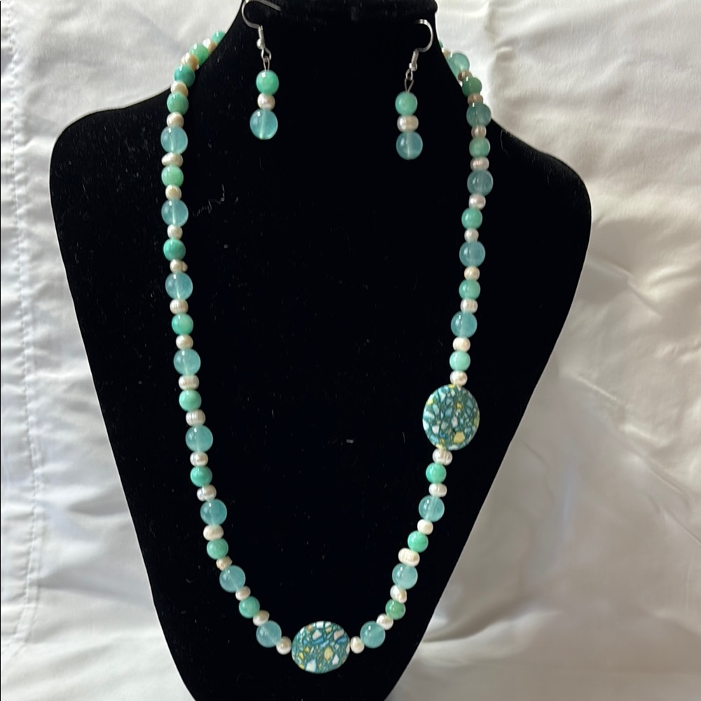 Hand Crafted Blue and White Necklace with Ornamental Focal Point